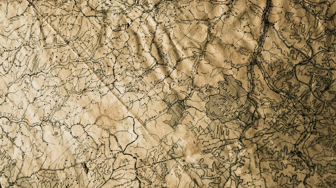 Ancient parchment map with intricate hand-drawn detail